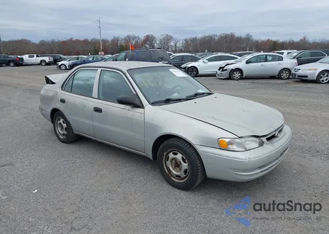 1999 Toyota Corolla Ve из США, поврежденный, VIN 2T1BR12E1XC128924